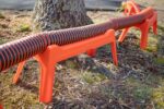 Camco Rhino RV Sewer Hose Support | Stable Setup | Extends Over Uneven Terrain | (43072)